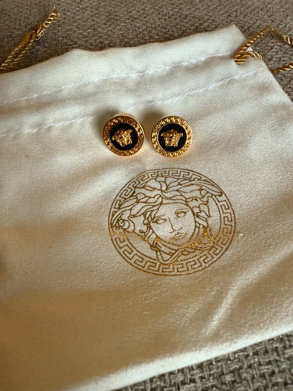 Versace stud earrings
